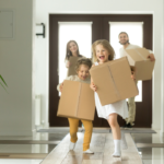 Happy family moving to their new rental home