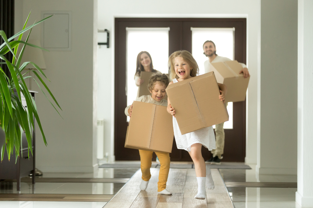 Happy family moving to their new rental home