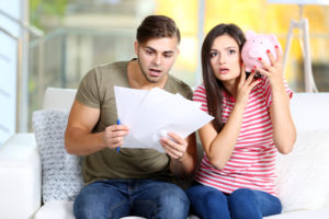 Couple looking at their energy bill savings