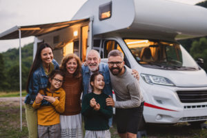 Family on a budget travel adventure with a campervan