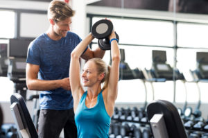 Woman with her personal trainer