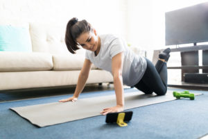 Woman exercising with a fitness app