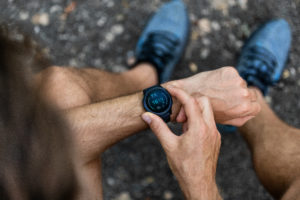 a man checking his fitness tracker