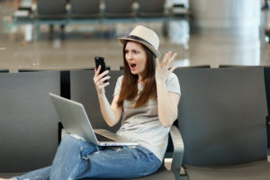 Irritated dissatisfied traveler tourist woman 