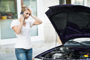 A woman calling a recall for a broken car
