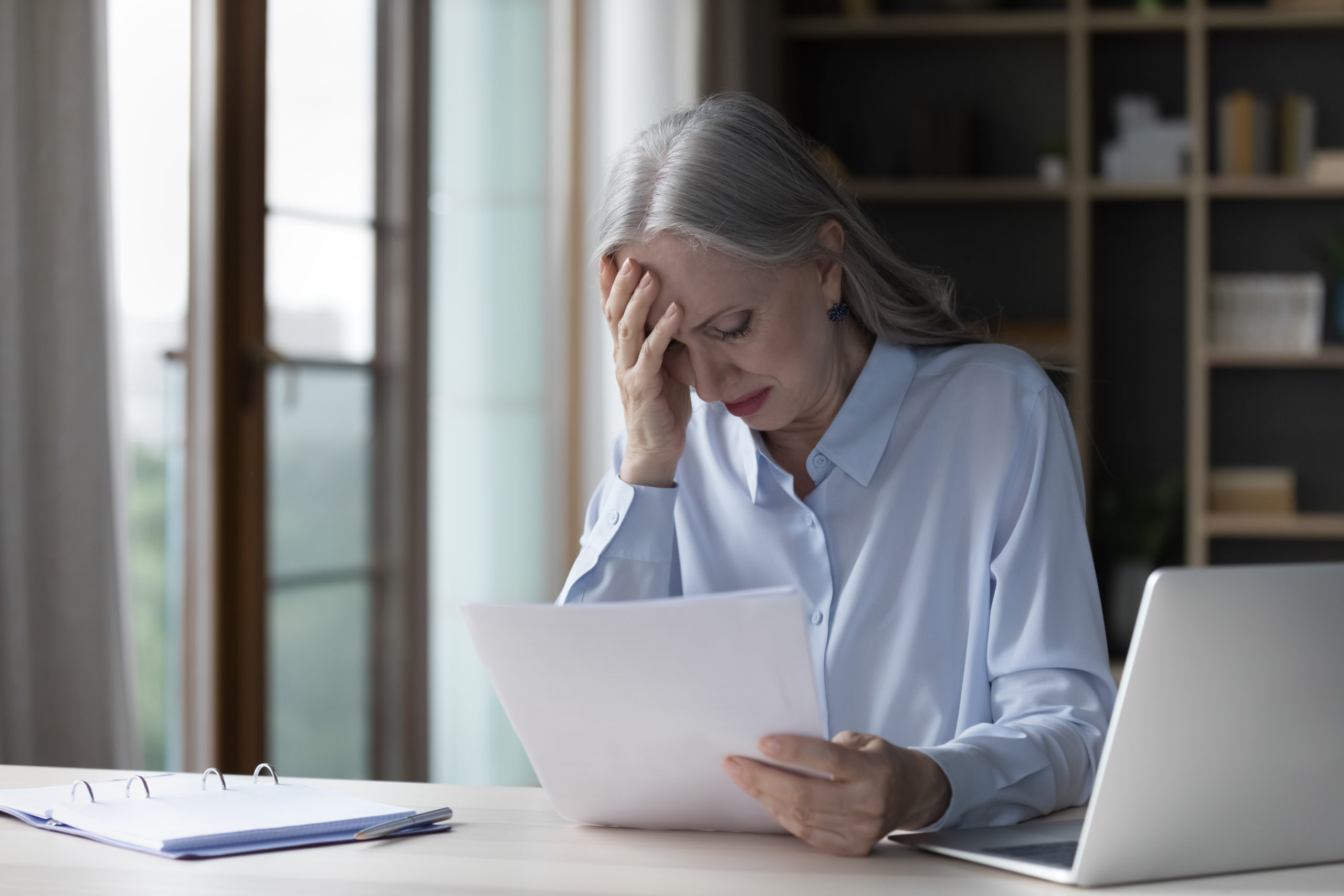Frustrated woman due to rejected insurance claim