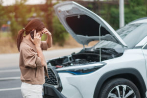 A woman dealing with Hyundai engine complaint
