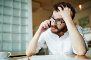 A man calling to dispute his insurance claim