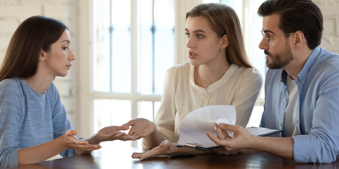 Frustrated young couple complaining about an insurance company