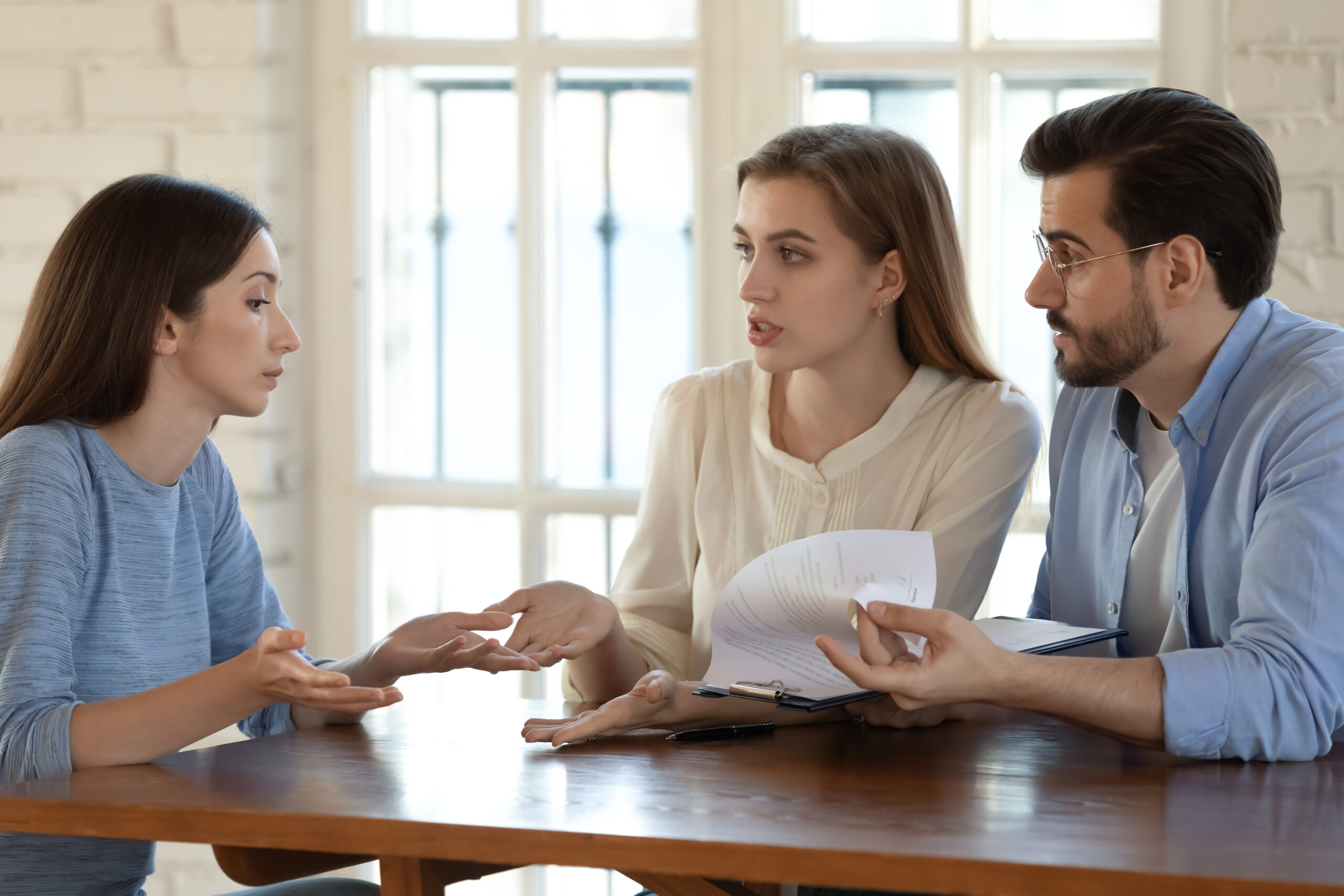 Frustrated young couple complaining about an insurance company