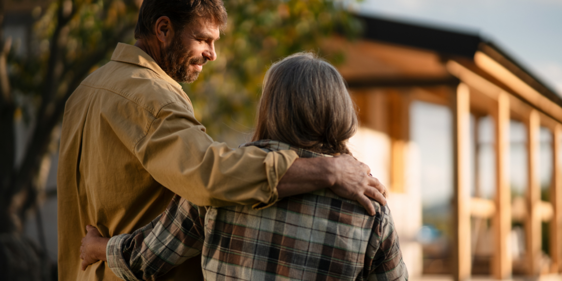 A couple staring at their unfinished home, left in limbo after their builder goes into liquidation