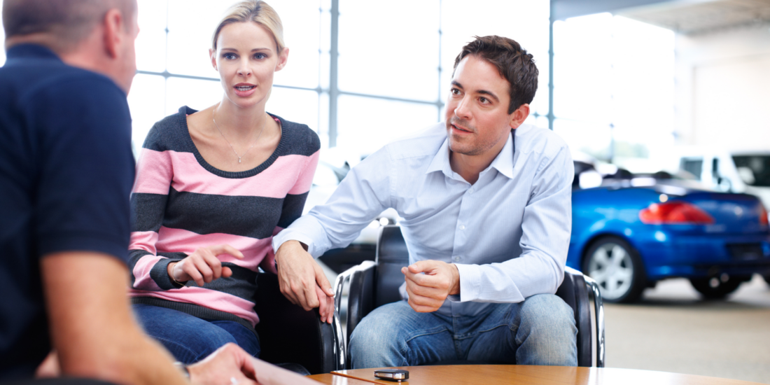 Anxious couple seeking help with their car insurance claim