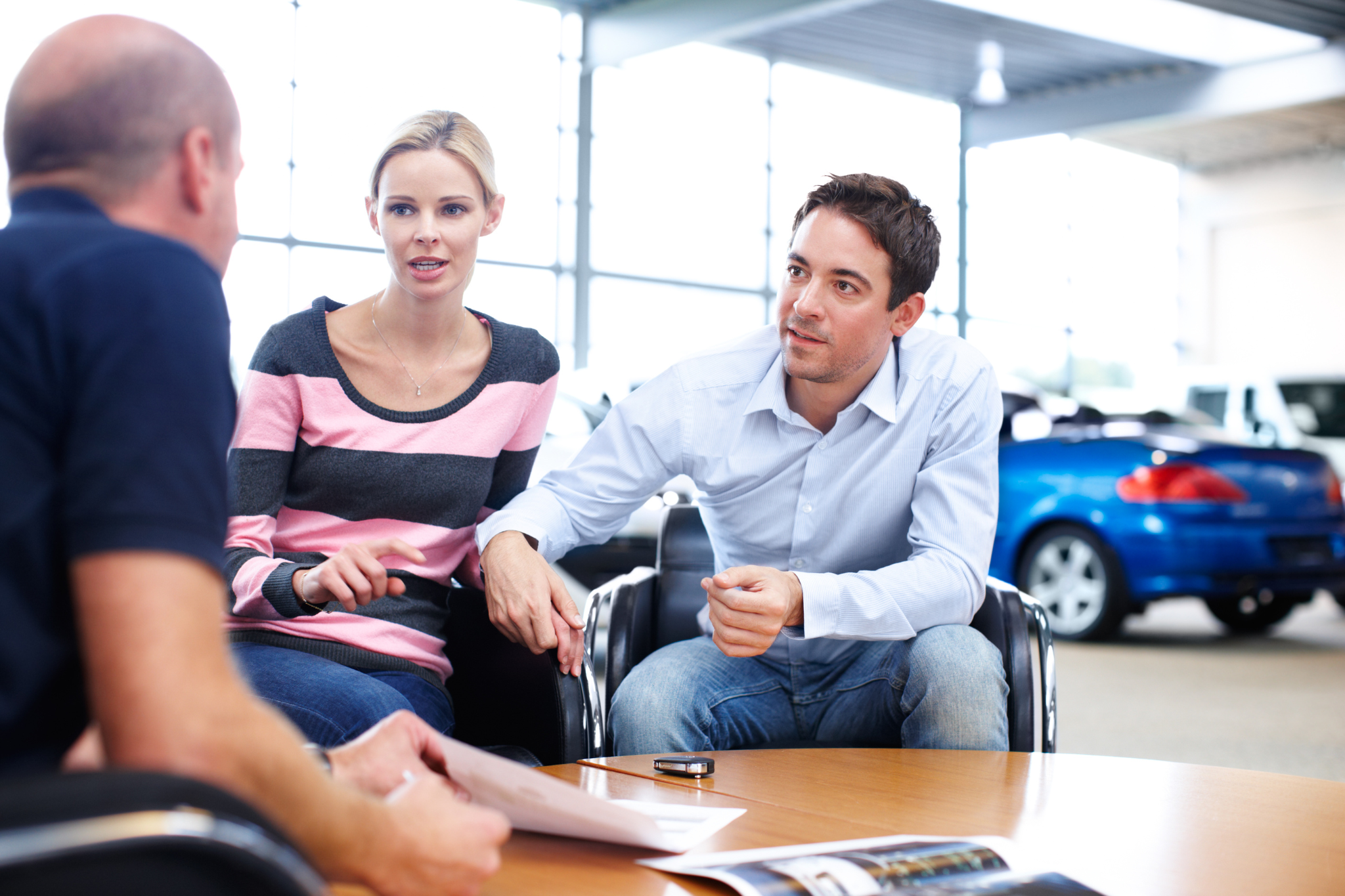 Anxious couple seeking help with their car insurance claim