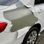 Massive peeling paint on a Toyota car