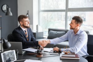 A lawyer and funder meeting about class action costs