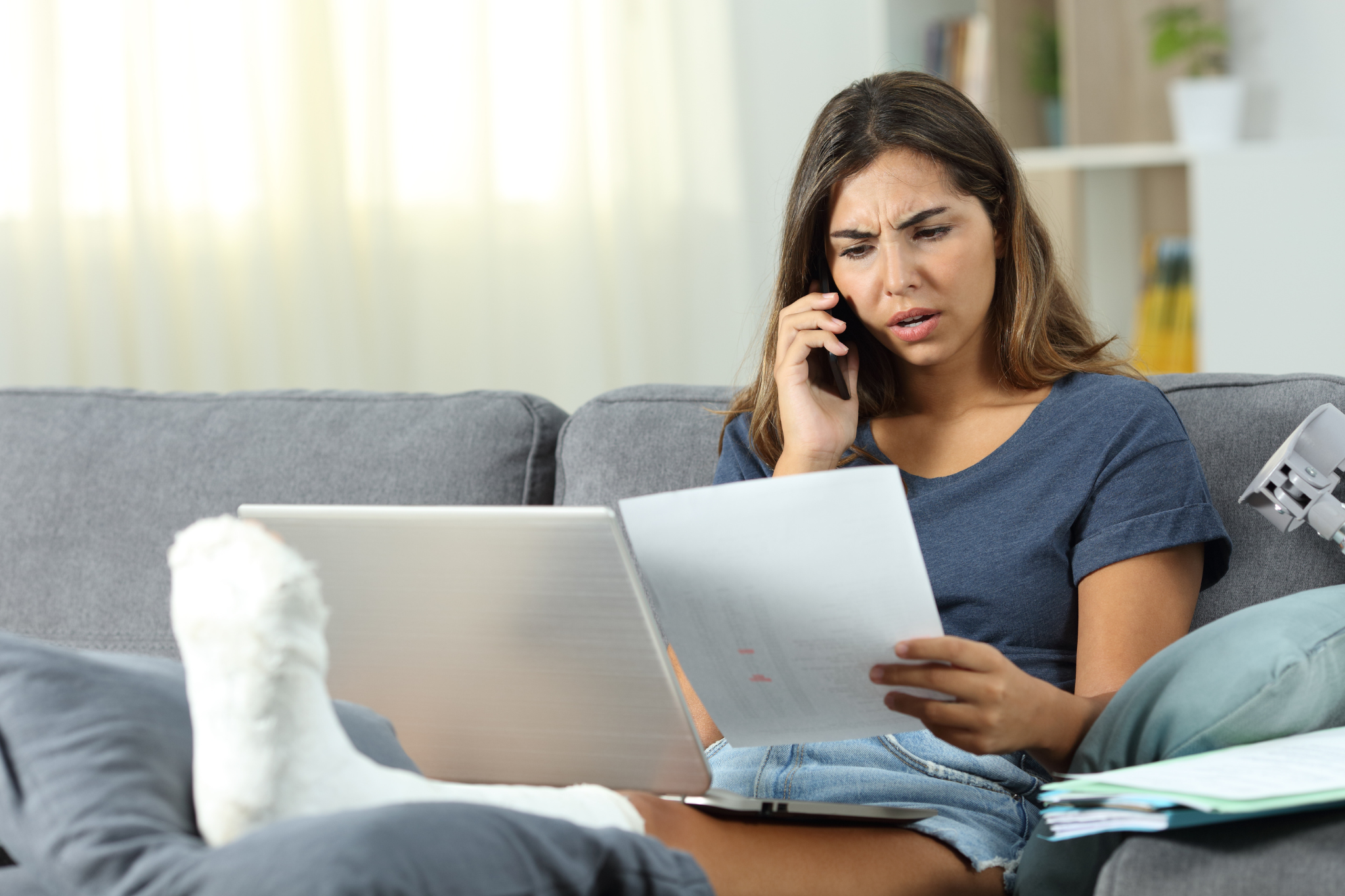 An injured woman complaining after reading what income protection does not cover