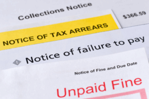 Close-up of a government letter resembling a Robodebt notice about an unpaid debt