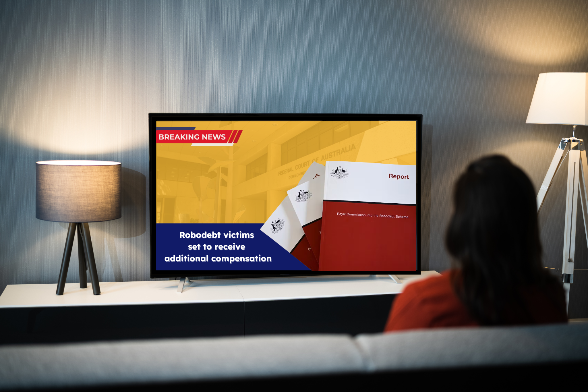 A woman watching a tv news report about the Robodebt class action settlement, showing a Federal Court building and a Royal Commission report on screen
