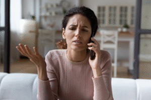 A woman calling her BNPL provider to file a complaint