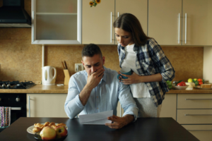 Couple reviewing VIQ Solutions court transcripts at their kitchen table