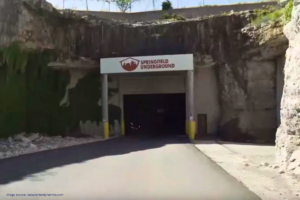 Entrance to an underground data centre, a road leading into a tunnel cut into a limestone cliff in Springfield, Missouri